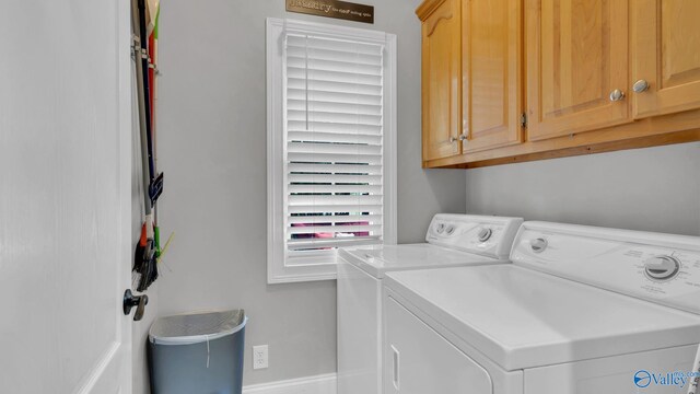 44 Jeff St, Scottsboro, AL 35769 - laundry area with washing machine and dryer and cabinet space