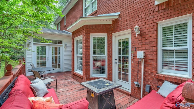 44 Jeff St, Scottsboro, AL 35769 - wooden deck featuring french doors