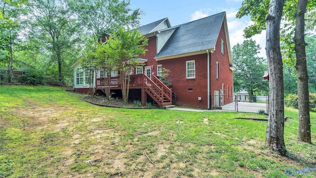 44 Jeff St, Scottsboro, AL 35769 - rear view of property featuring stairs, a wooden deck, brick siding, and a shingled roof