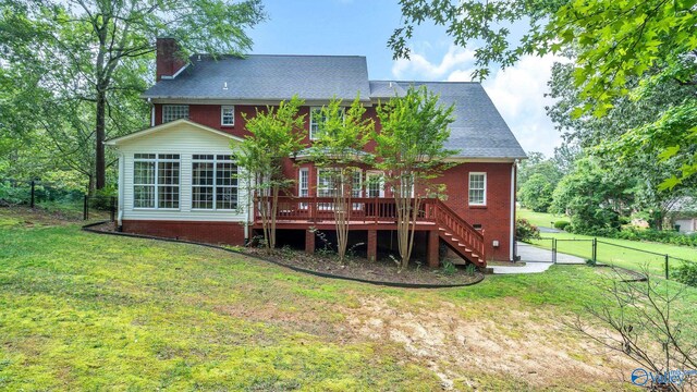 44 Jeff St, Scottsboro, AL 35769 - rear view of property with a chimney, a wooden deck, a fenced backyard, stairway, and crawl space