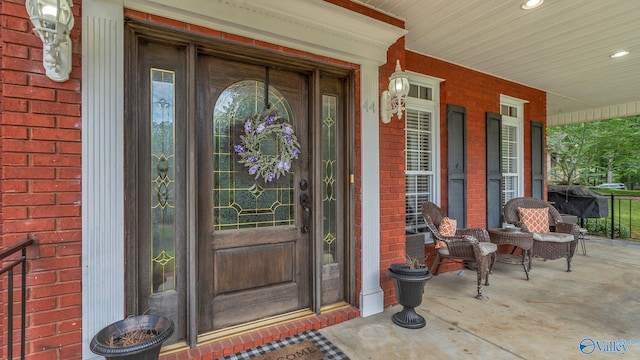 44 Jeff St, Scottsboro, AL 35769 - entrance to property featuring brick siding and covered porch