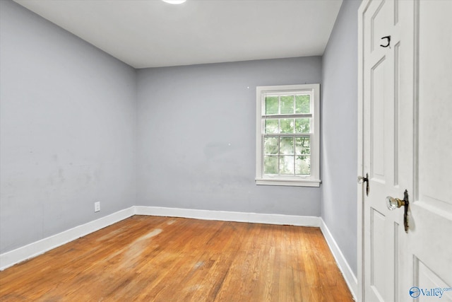1617 7th St SE, Decatur, AL 35601 - unfurnished room with light wood-style flooring and baseboards
