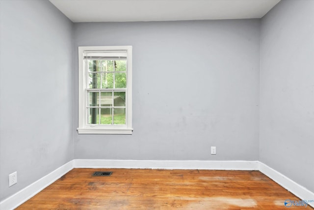 1617 7th St SE, Decatur, AL 35601 - unfurnished room with wood finished floors and baseboards