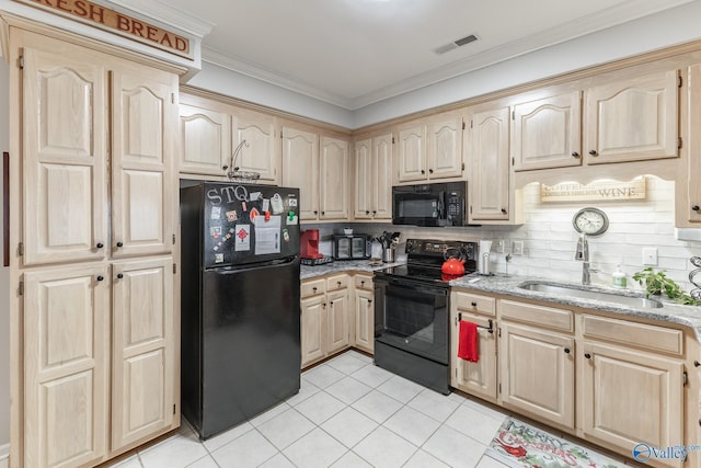 kitchen featuring light brown cabinets, black appliances, sink, crown molding, and light tile patterned flooring