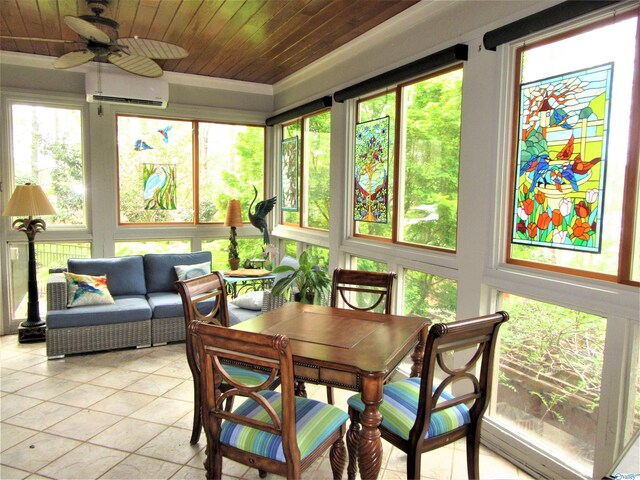 sunroom featuring ceiling fan, plenty of natural light, and wooden ceiling