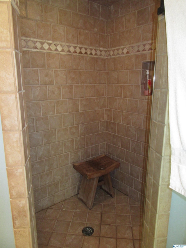 bathroom featuring tiled shower