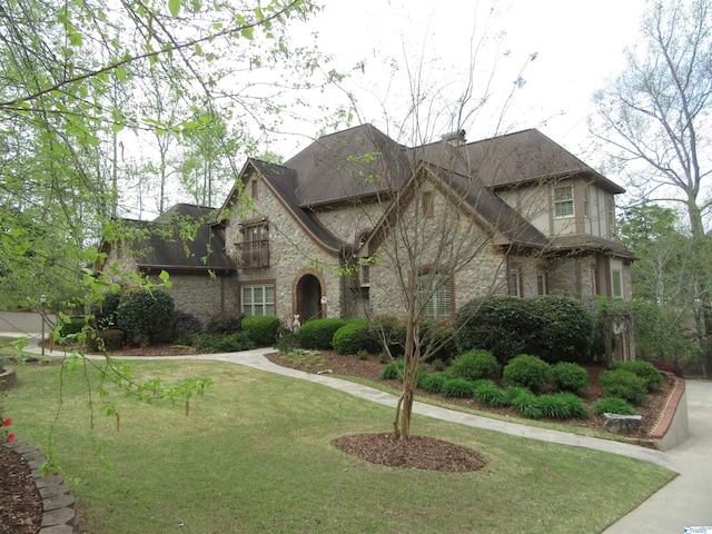 view of front of home with a front yard