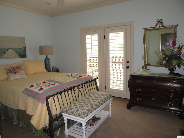 bedroom with access to exterior, crown molding, and carpet flooring