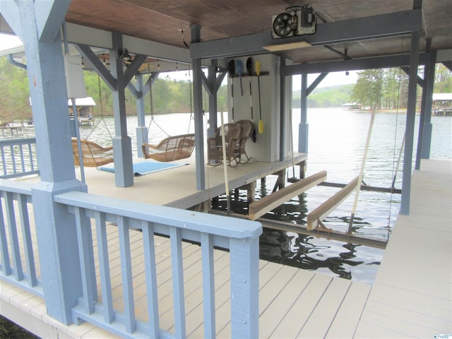 dock area featuring a water view