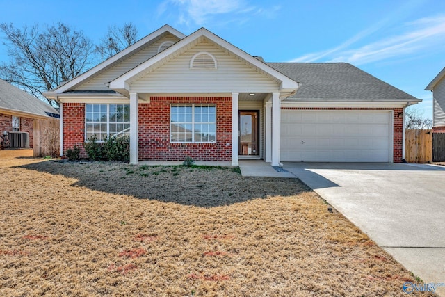 single story home featuring central AC, fence, concrete driveway, a garage, and brick siding