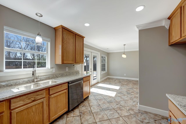 kitchen featuring pendant lighting, a sink, crown molding, baseboards, and dishwasher