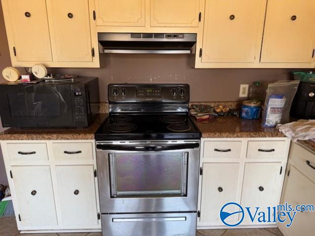 kitchen with white cabinetry, stainless steel electric range oven, black microwave, and extractor fan