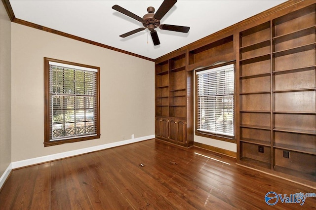 unfurnished bedroom featuring dark wood-type flooring, multiple windows, crown molding, and baseboards