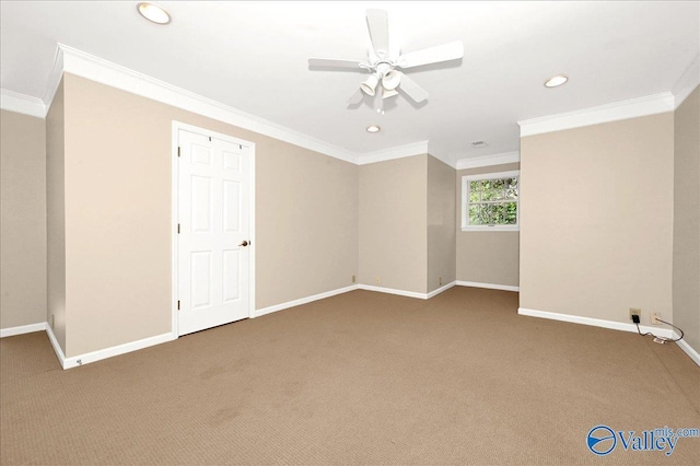 carpeted spare room featuring recessed lighting, crown molding, baseboards, and ceiling fan