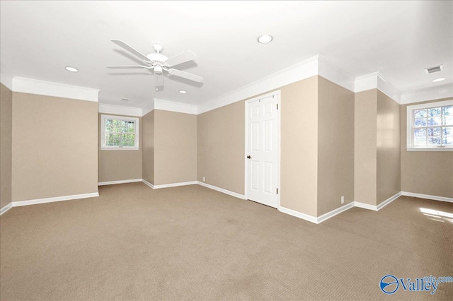 interior space featuring a ceiling fan, carpet flooring, visible vents, and baseboards