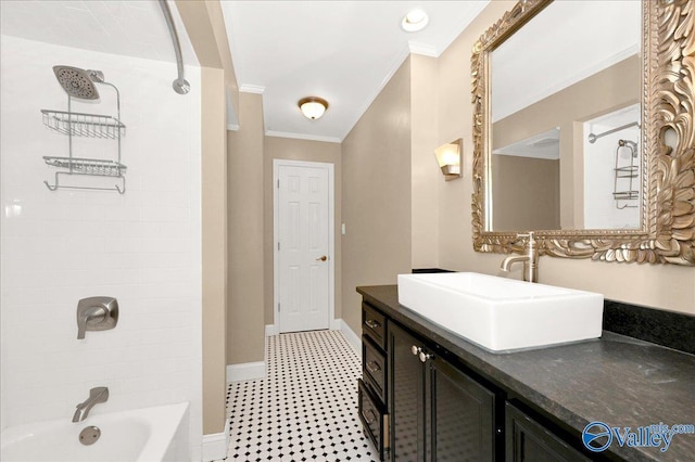 full bath featuring shower / bath combination, crown molding, vanity, and baseboards