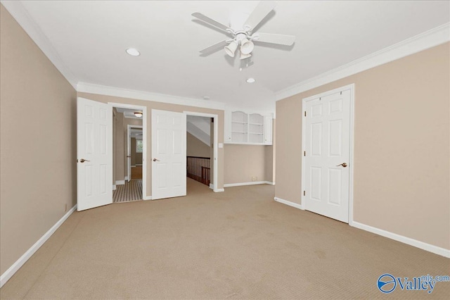 unfurnished bedroom featuring recessed lighting, baseboards, light colored carpet, and ornamental molding