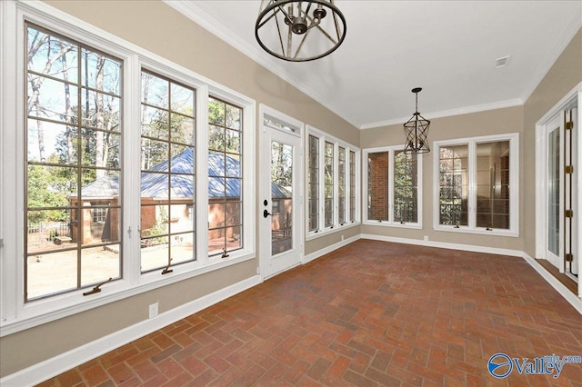 unfurnished sunroom with a healthy amount of sunlight