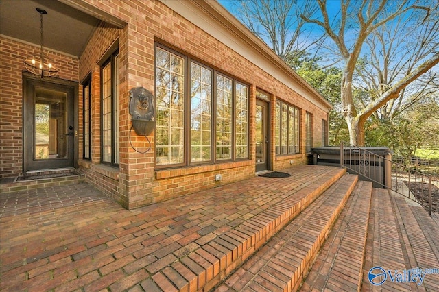 wooden deck with a patio area