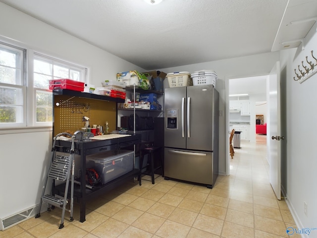 kitchen with stainless steel fridge