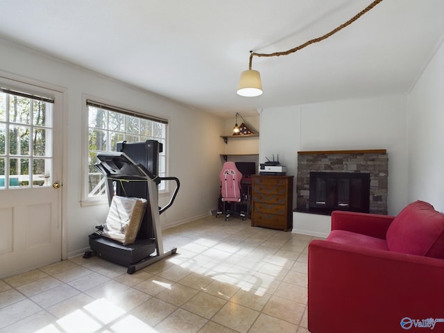 workout room featuring light tile patterned floors