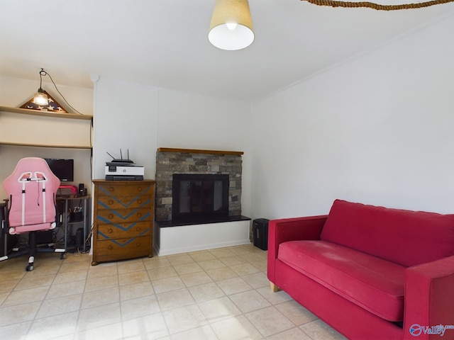 living room featuring a stone fireplace