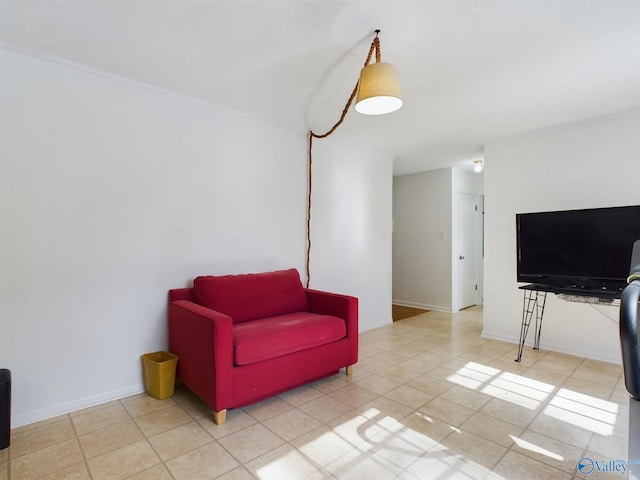 sitting room featuring light tile patterned floors