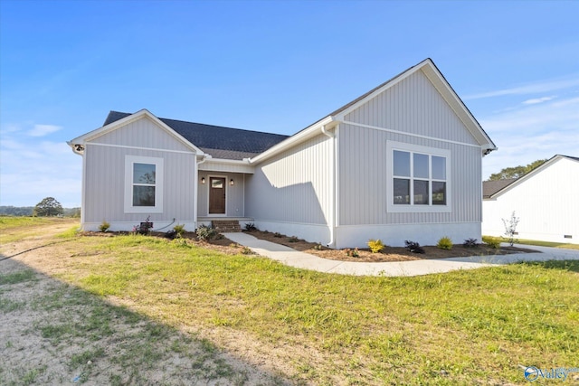 view of front of home with a front lawn