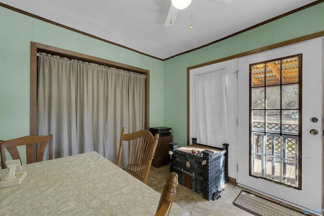 dining space featuring crown molding, plenty of natural light, and ceiling fan