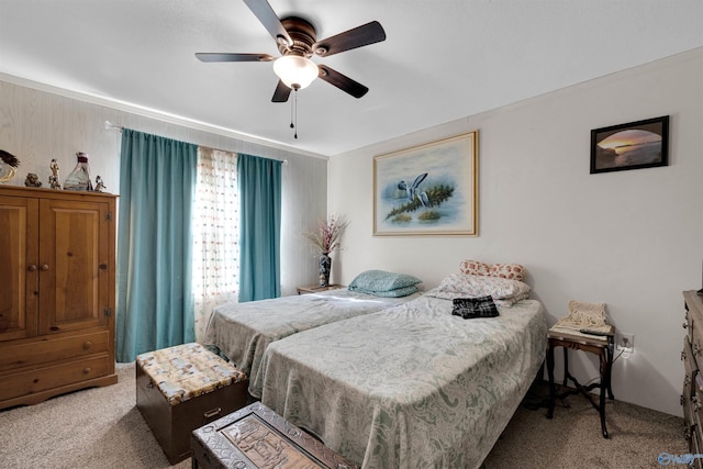 bedroom featuring ceiling fan and light colored carpet