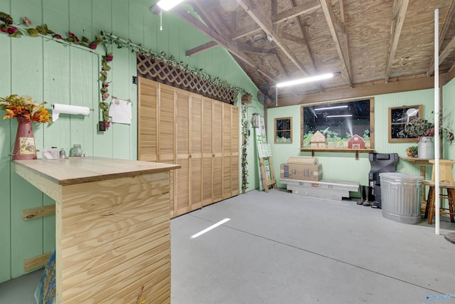 interior space featuring wood walls