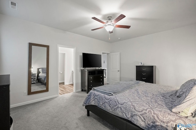 bedroom with visible vents, carpet flooring, baseboards, and a ceiling fan