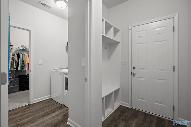 mudroom with washing machine and clothes dryer, baseboards, visible vents, and dark wood finished floors