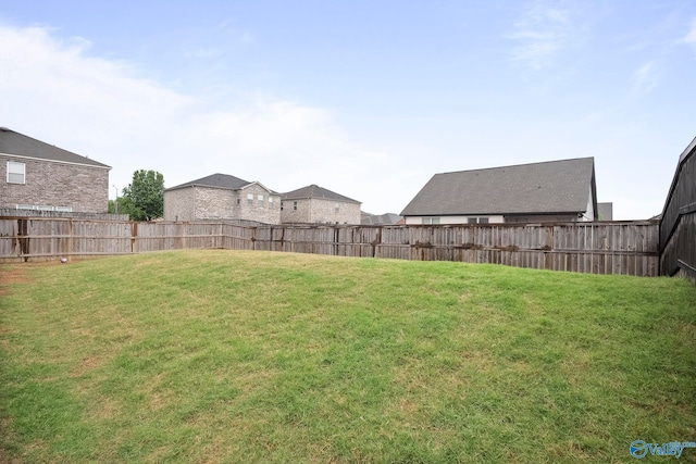 view of yard featuring a fenced backyard