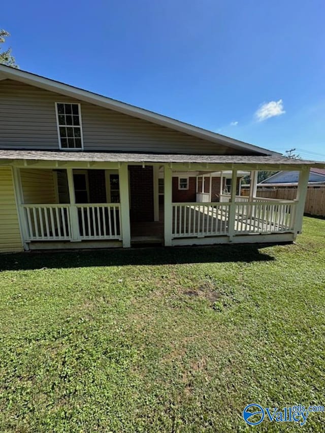 view of front of property with a front lawn and a porch