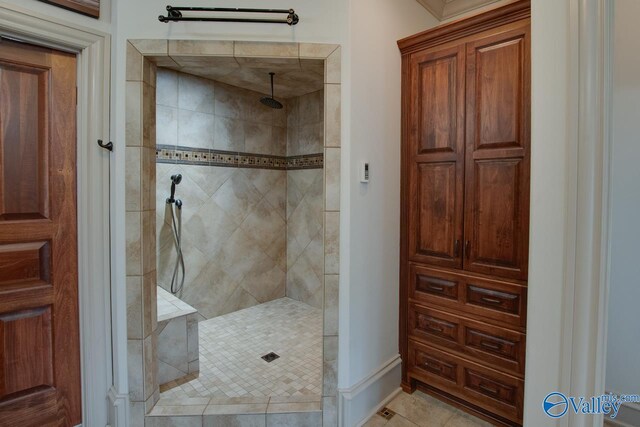 2602 Legacy Preserve Dr, Brownsboro, AL 35741 - full bath with a tile shower, tile patterned floors, and baseboards