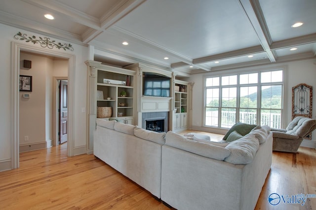 2602 Legacy Preserve Dr, Brownsboro, AL 35741 - living room featuring coffered ceiling, a fireplace, light wood-type flooring, crown molding, and beam ceiling