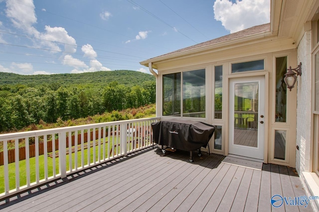 2602 Legacy Preserve Dr, Brownsboro, AL 35741 - deck with a lawn, a grill, and a view of trees