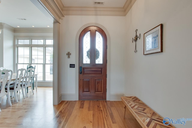 2602 Legacy Preserve Dr, Brownsboro, AL 35741 - entryway with light wood-style floors, crown molding, plenty of natural light, and baseboards