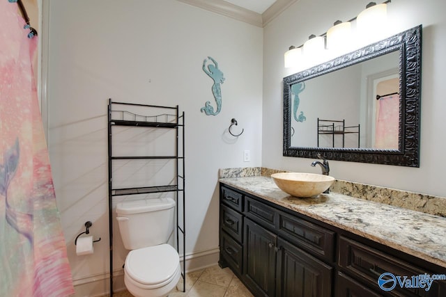 2602 Legacy Preserve Dr, Brownsboro, AL 35741 - full bathroom featuring vanity, toilet, crown molding, tile patterned floors, and baseboards