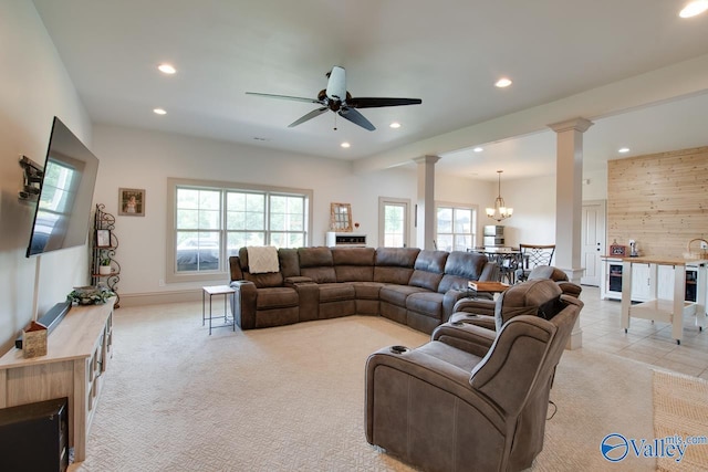 2602 Legacy Preserve Dr, Brownsboro, AL 35741 - living room with decorative columns, recessed lighting, plenty of natural light, a chandelier, and ceiling fan