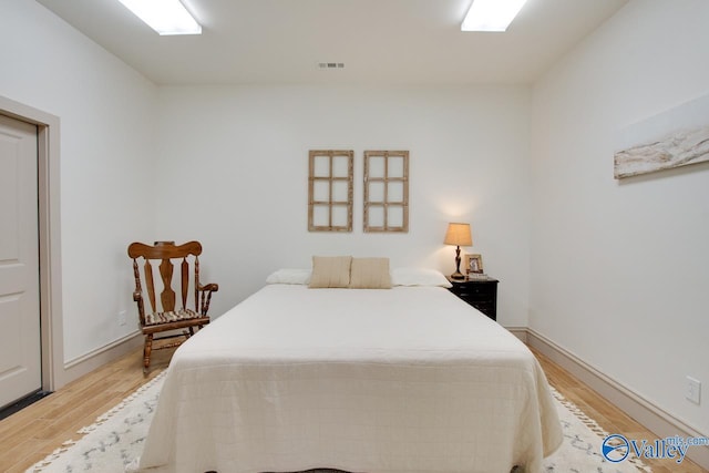 2602 Legacy Preserve Dr, Brownsboro, AL 35741 - bedroom featuring light wood-style floors and baseboards