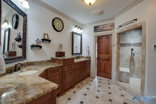 2602 Legacy Preserve Dr, Brownsboro, AL 35741 - full bathroom featuring two vanities, a walk in shower, crown molding, and tile patterned flooring