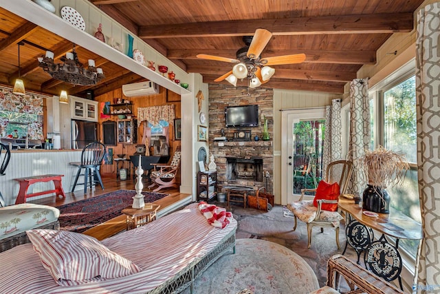 living room featuring ceiling fan, a wall mounted AC, wood-type flooring, lofted ceiling with beams, and wooden ceiling