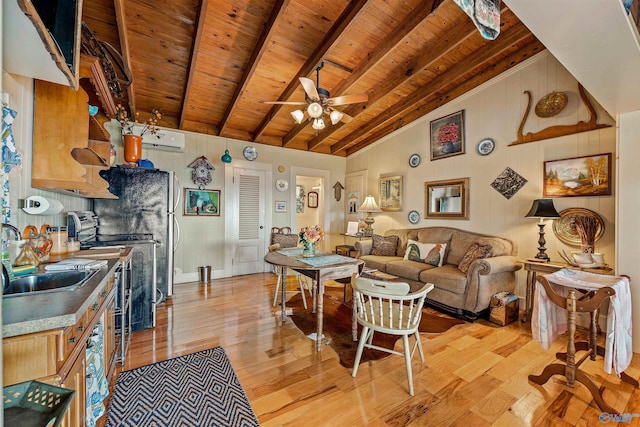 interior space featuring sink, vaulted ceiling with beams, wood ceiling, and light wood-type flooring