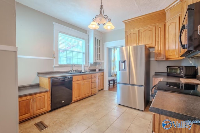 kitchen featuring black appliances, pendant lighting, a notable chandelier, sink, and light tile patterned flooring