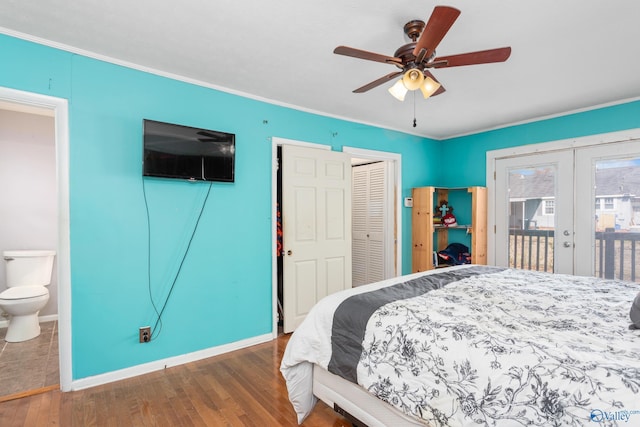 bedroom with ornamental molding, wood finished floors, french doors, baseboards, and access to exterior