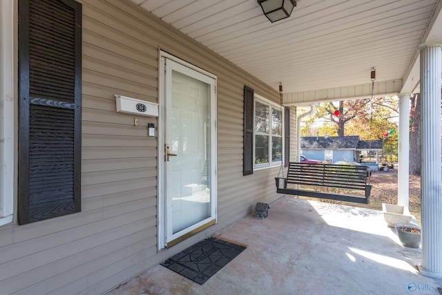 view of patio featuring a porch