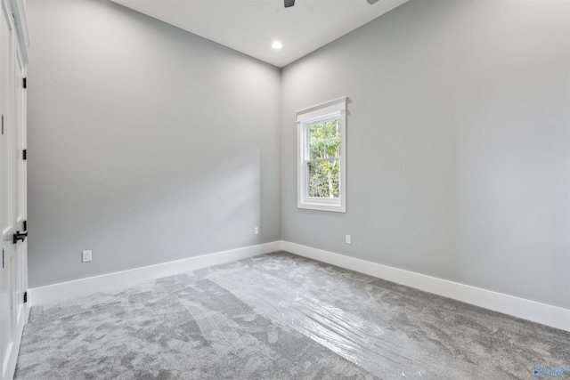 spare room with a ceiling fan, baseboards, carpet flooring, and recessed lighting