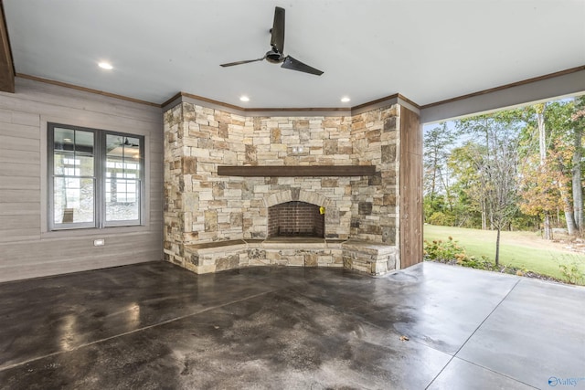 view of patio / terrace with ceiling fan, french doors, and an outdoor stone fireplace